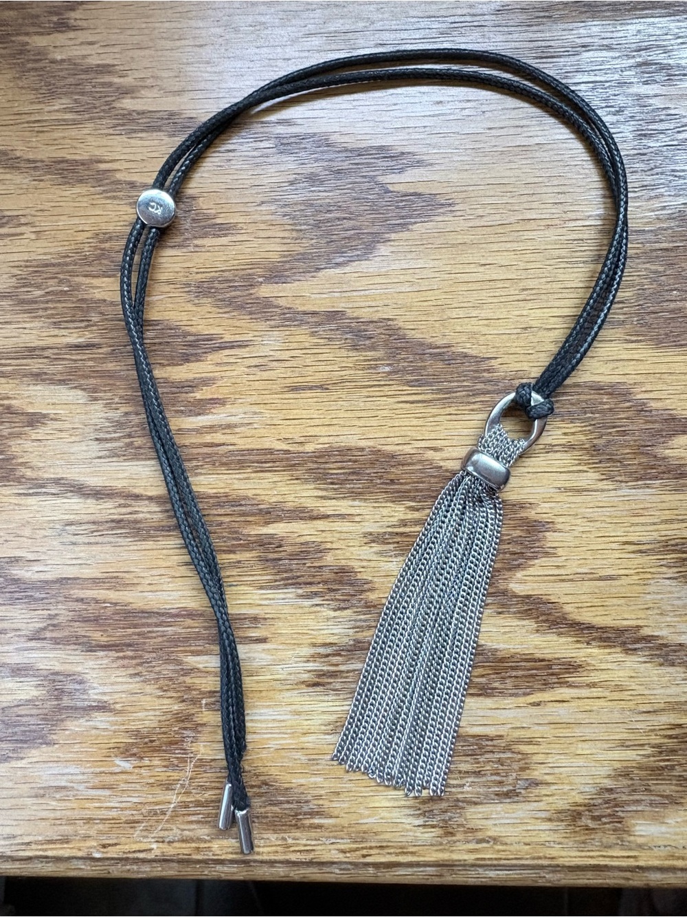 Kenneth Cole Black Cord Necklace with Silver Tassel Lariat